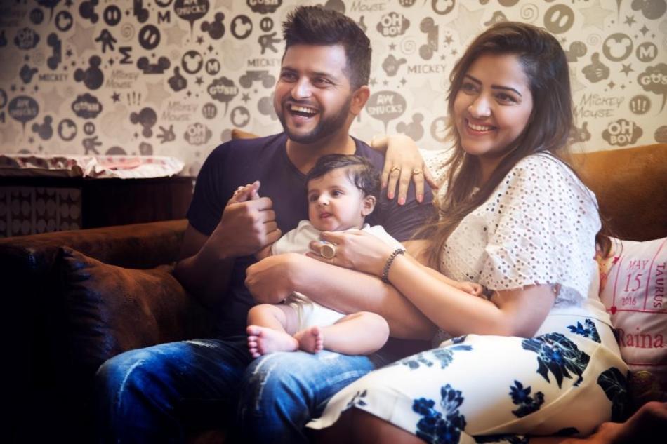 Suresh Raina & Priyanka Raina with their daughter.JPG