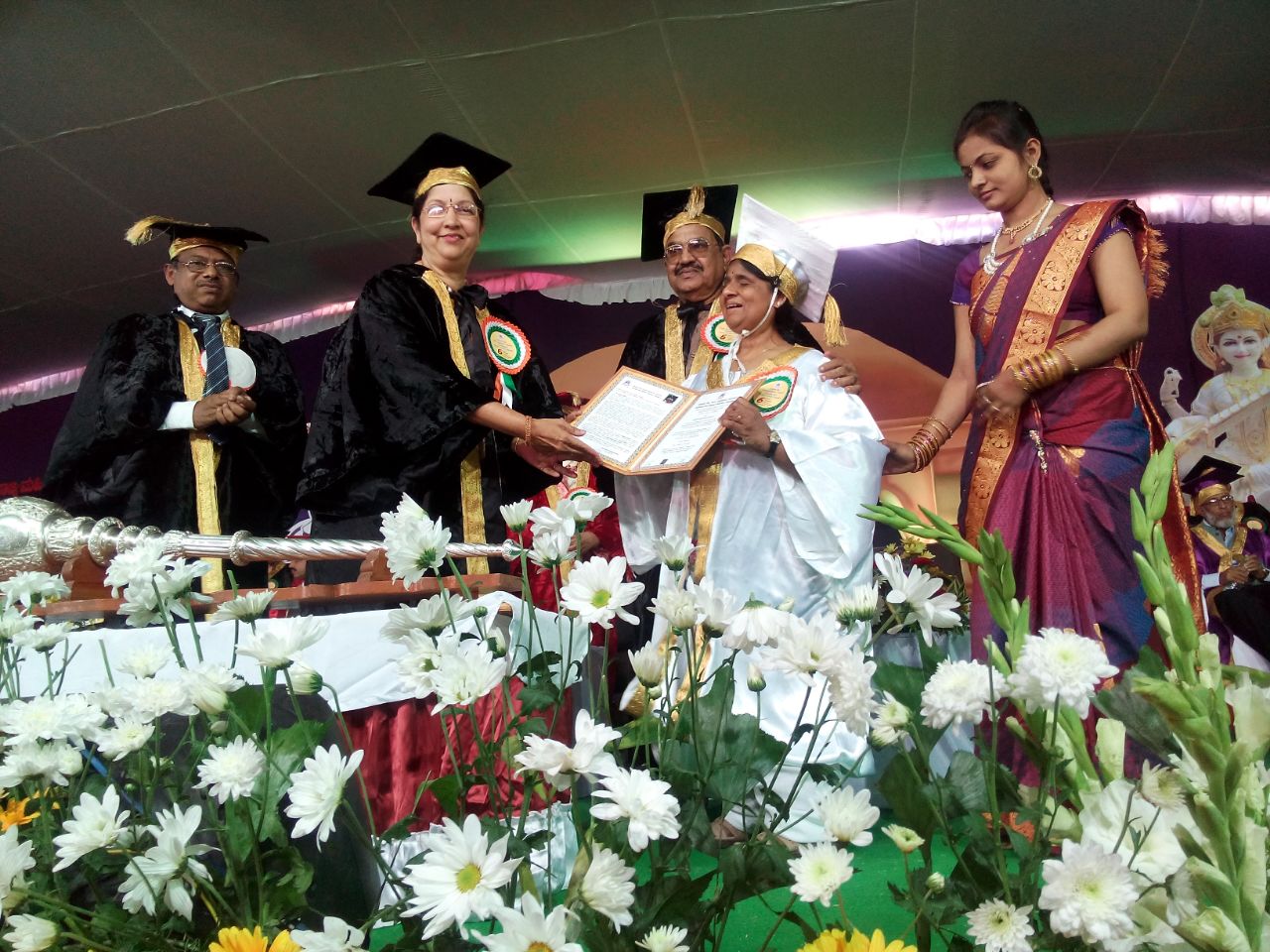 Madhu Singhal receiving doctorate